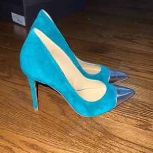 MK heels with silver tip.